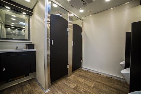 Luxury portable restrooms. Luxury Portable Restroom Trailer Units. The 4-stall majestic trailer is a self-contained luxury restroom trailer that is solar powered with 45-gallon fresh water tanks each stall. Each restroom has a porcelain flushing toilet with foot pedal flush, push button faucet, air conditioning, toilet seat covers, soap dispenser, recessed LED lighting ... 