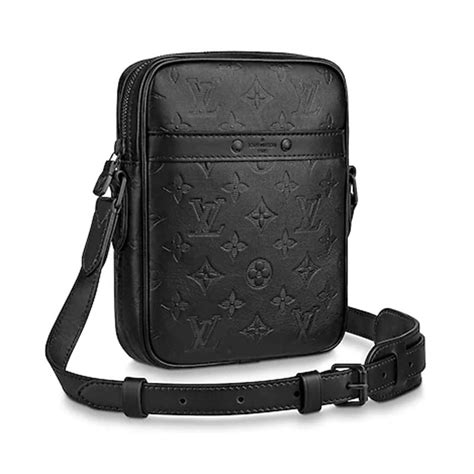 Discover Louis Vuitton Trio Messenger: This item has very limited availability online and in select stores.<br><br>The Trio Messenger bag for men is made from Monogram Eclipse canvas and its mirror twin, Monogram Eclipse Reverse. The iconic motif in tone-on-tone shades of gray complements the lines of this functional hybrid. More than a traditional cross-body bag, it has a removable ....