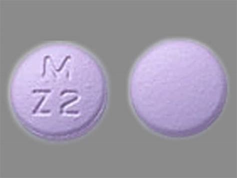 M Z2 purple round pill - M Z2 round purple pi