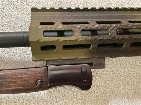This handguard extends past the Handguard cap and is desi
