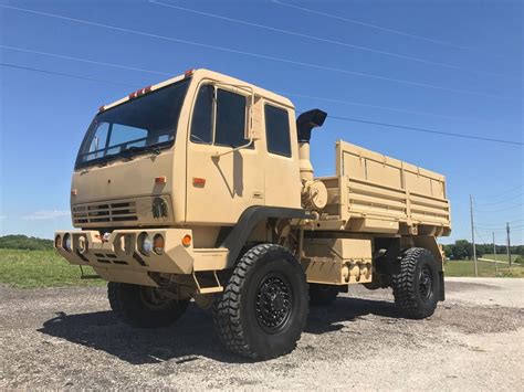 M1087 for sale. Details. 1998 Stewart & Stevenson LMTV M1079 4X4 Camper Truck. - 185 Miles. - Cat 3116 with 225 horsepower the engine is the non-electronic, highly dependable. - Allison 7-speed automatic. - 395/85R20 Goodyear Super Singles 90% Or Better. - Full size Michelin spare. - Interior Is In Excellent Condition for the age of the vehicle. - LED Headlights. 