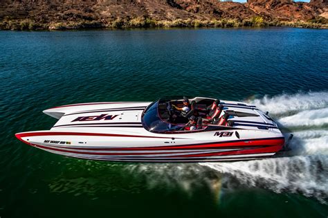 M31 boat. 2011 Daves Custom Boats M31. 2011 DCB M31 Widebody. Twin Mercury Racing QC4V 1350's w/140 Hours On Brand New Mercury Racing Power. M8 Drives w/90 Hours. Cool Touch Vinyl. Under Water Lighting. LED Interior Lighting. Cockpit Cover. 6 Place Intercom System w/Boat to Boat Radio. Mercury Raceview. 