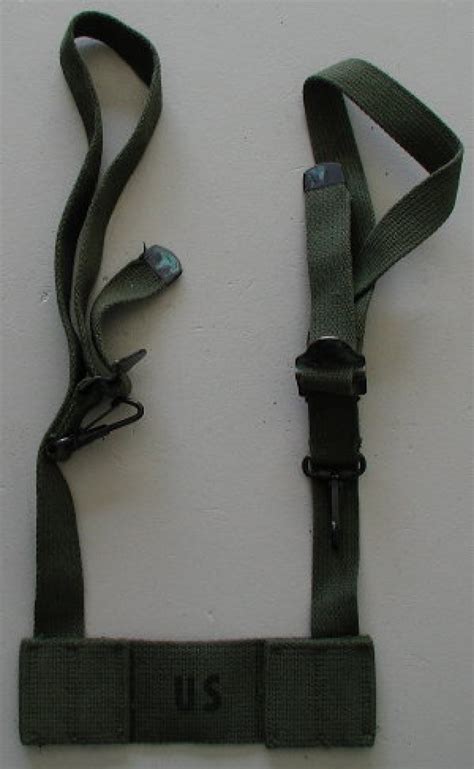M56 buttpack adapter.  M-56 Field Pack Adapter.  When were the M-1956 buttp...