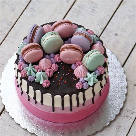Macaron birthday cake. Add a free custom cake banner like "Happy Birthday Maria" or "Happy Anniversary". Max 35 characters. 4. Add ... 