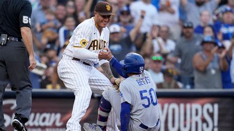 Machado hits a home run and a 2-run, go-ahead single to lift the Padres over the Dodgers 8-3