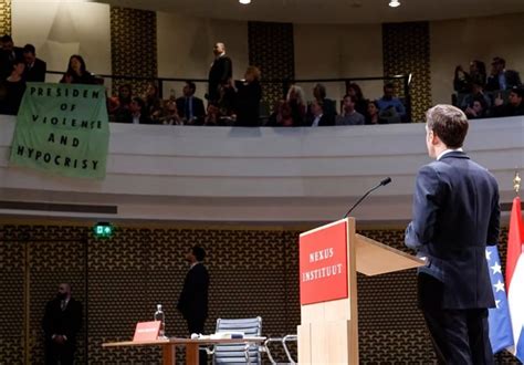 Macron heckled by protesters during speech in the Netherlands