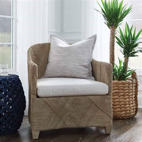 Made goods furniture. Extend modern style to the outdoors with our Neal stool, featuring a structured teak frame. Wrapped in a loose weave of flat faux wicker, it offers a slight angled back recline for comfort. 