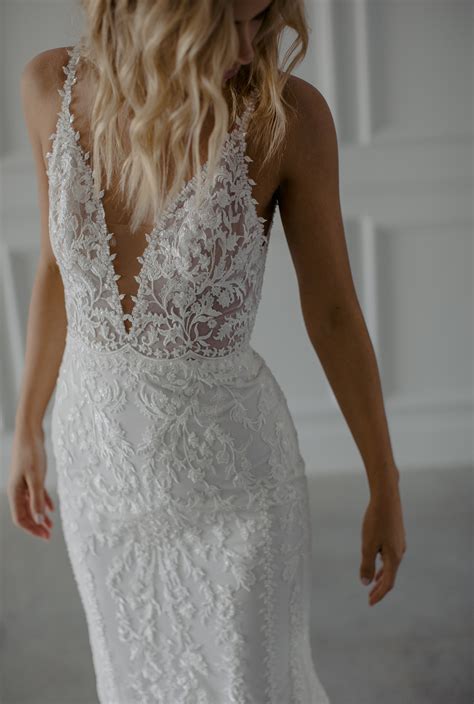 Made with love bridal. From $3,300.00 USD. The only thing that will sparkle brighter than Sebastian on your wedding day is your love's smile when they see their bride floating down the aisle in this dress. Sebastian's intricately beaded lace is like no other when it comes to radiance and lustre. Her full, flowy skirt and elegant sparkle contrasts beautifully with her ... 
