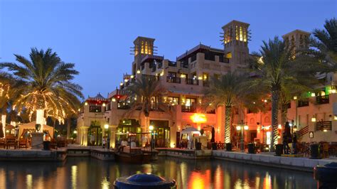 Madinat jumeirah. The 294-room Al Qasr is a seriously upscale, Arabian palace-style hotel with stunning interiors set in the exclusive Madinat Jumeirah resort in central Dubai. Comprising of lovely canal-like waterways and manicured tropical gardens that lead to a mile-long beach, the grounds are particularly impressive, as is the almost innumerable selection of ... 