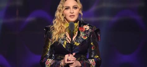 Madonna announces rescheduled Denver date
