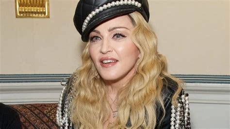 Madonna delays tour after infection sent her to ICU