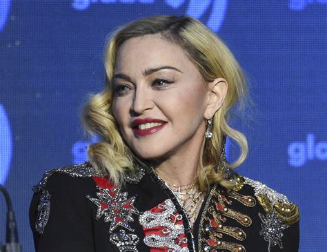 Madonna says she’s ‘on the road to recovery’ following ICU stay, postpones North American tour dates