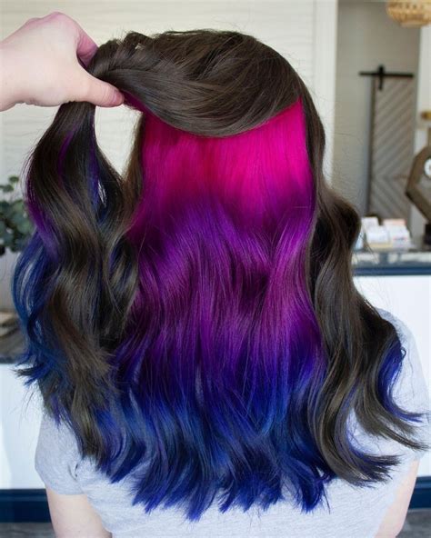 Mar 11, 2024 · Black hair that ends in a brazen brown ombre with blonde peekaboo highlights – this hair color is all warmth and fire. It’s perfect for those autumn and winter nights when it’s cold outside and cozy inside. The curls at the ends round off this look beautifully. 15. Unicorn Blend. 