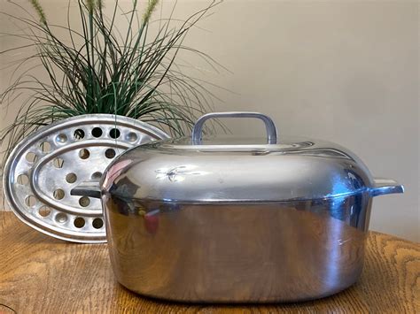 Magnalite saucepan. This vintage Magnalite saucepan pot is a classic addition to any kitchen. The 3 quart capacity and 2-piece set make it versatile for use on induction, electric, and gas stovetops. The round shape and 