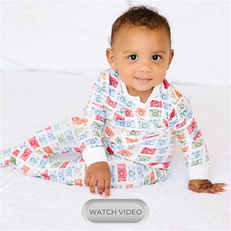 Magnetic me baby. easy-on baby dresses with magnetic closures, playful ruffles + diaper covers. magnetic fasteners. supremely soft. sustainably made. 