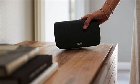 The overall design and build of the Polk Audio MagniFi Mini Sound Bar is small and compact. It is just 3 inches high, 13 inches wide, and 4 inches in length. The soundbar body is made up of plastic, but the build quality is good and sturdy. The speaker bar is also surrounded by cloth lining and has a premium look to it.. 