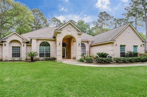 Magnolia tx homes for sale. 4 Beds. 4.5 Baths. 4,484 Sq Ft. 27042 Hardin Store Rd, Magnolia, TX 77354. Welcome to this custom home that boasts 4 BR's, and 4 1/2 baths. It sits on a sprawling 3 acre (+/-) lot, providing a blank canvas for anything you like! It also features high ceilings, warm hardwoods, a balcony, outdoor kitchen, and huge deck. 