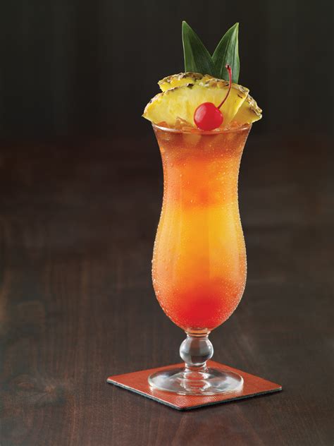 Mai tai drink. Mai Tai, Tahitian for "Out of This World - The Best," was created by Victor J. "Trader Vic" Bergeron in 1944. Crafted from premium rums and a hit of fruit, the Mai Tai is a delectable drink with many variants. This is the original recipe. 
