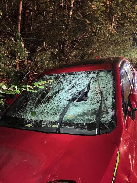 Maine police say a driver on drugs swerved off a road and hit 4 troopers