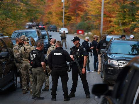 Maine police surround home in search for suspect in the fatal shooting of 18
