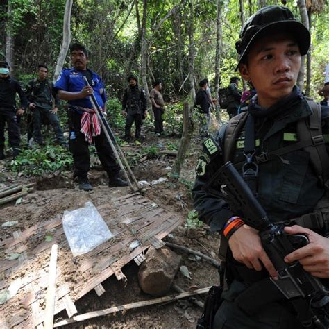 Malaysia charges 4 Thais over the mass graves and human trafficking camps found in 2015