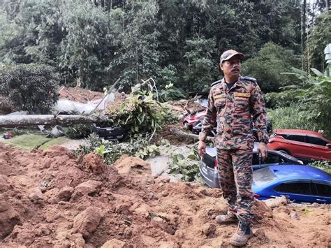 Malaysia says landslide that killed 31 people last year was caused by heavy rain, not human activity