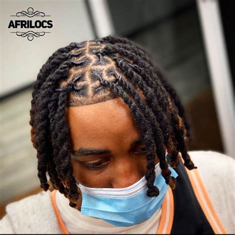 Male 2 strand twist dreads. These two strand twists were very easy. The rubber bands were not tightly applied to the hair. My main focus is to always protect the hair. Thanks for watchi... 