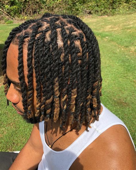 3. Sleek Short Twists. Although a two-strand twist short hair male is a popular style, elegant and short twists are also gaining popularity. It is a protective hairstyle for men with short hair. These braiders offer the most versatile styling options and can be worn in various ways.. 