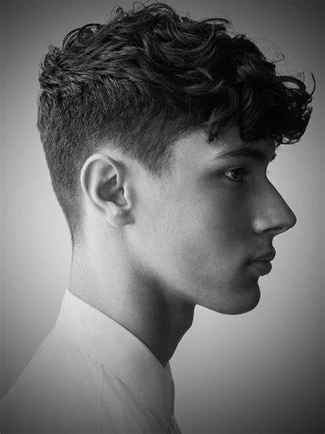 Male haircuts wavy. 3. Subtle Undercut. Save. Short wavy hair with undercut is ideal for guys with beards. Undercut portions have a pruning effect that makes space for a full beard and gorgeous textured hair. Push all of the hair back off of the forehead for a sexy, confident vibe. 4. Short Mohawk. Save. 