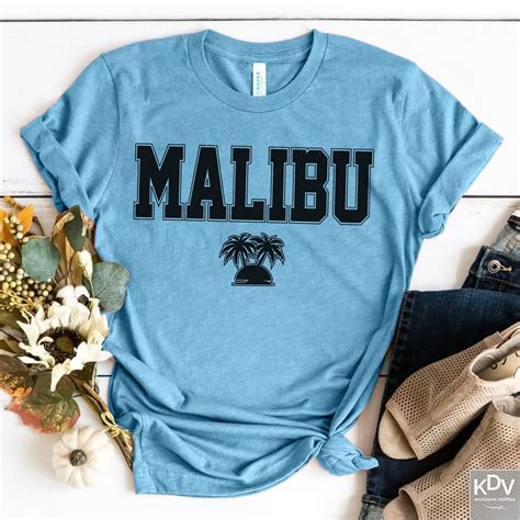 Malibu shirts. Showcase your feminine frame when you shop the latest collection of tank tops from Malibu Shirts. Find a variety of styles and colors to choose from, including classic, modern, and vintage designs. Get the perfect tank top for any occasion. 