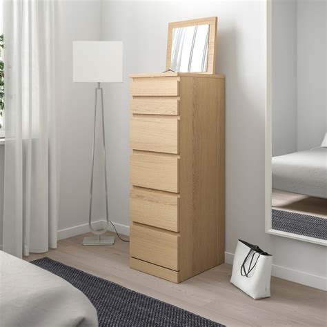 A German shrunk, or schrank, is a type of tall furniture that can be a combination of cabinetry, shelving, drawers and closets. Modern models may include space for a television or an entertainment center.. Malm 6 drawer