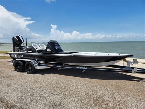 Mamba, a semicustom builder, will arrange hatches, storage areas, live wells and other components as the client wishes. Pike has sold four boats, including three sales at the Palm Beach show. The 350 will also be offered in an extended console version with a berth and an express version, says Pike. Base price with Suzuki 300s is $208,500.. 