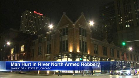 Man, 63, robbed and struck on hand in River North
