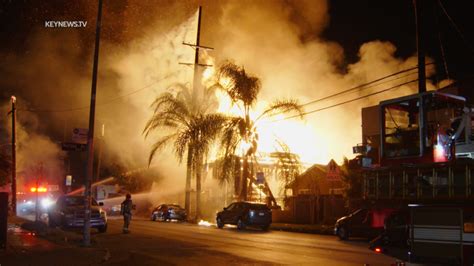 Man, woman seriously hurt as fire torches entire city block in South L.A.