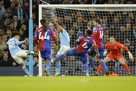 Man City squanders two-goal lead to draw with Crystal Palace in latest setback to title defense