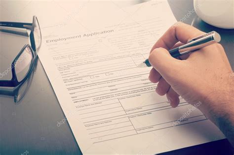 Man Filling a Job Application Form Stock Image Image of form