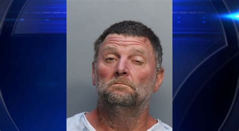 Man arrested, charged after nearly ramming into FHP trooper during pursuit, jumping into canal