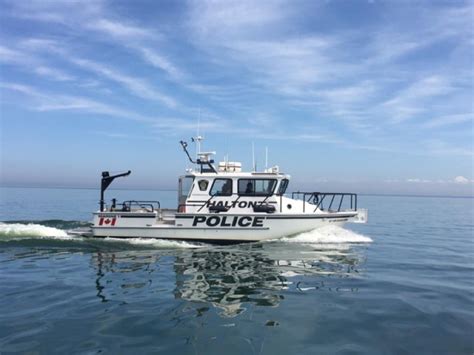 Man attempts to evade Halton police by jumping into Lake Ontario, hiding in pipe