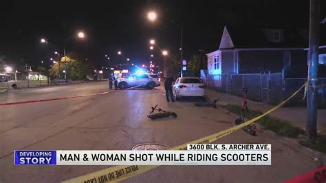 Man critical, woman injured after being shot while driving scooters