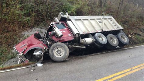 Man dies after backed over by dump truck in Brighton