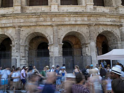 Man filmed carving his name on the Colosseum is a tourist living in Britain, Italian police say