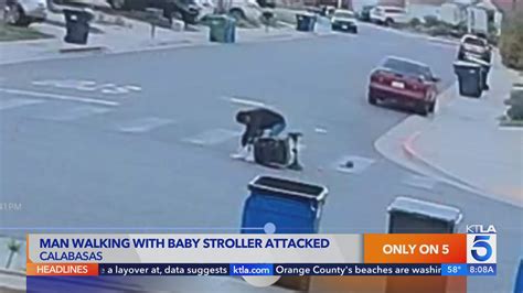 Man punched in face while pushing granddaughter in stroller