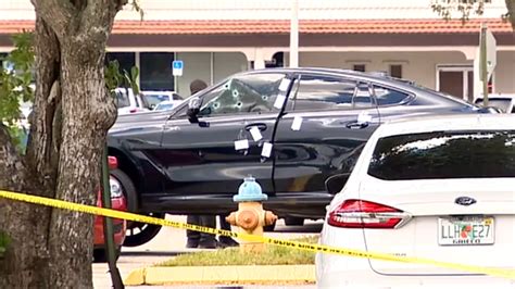 Man shot and killed in parking lot of Miami Gardens strip mall; 2 at large