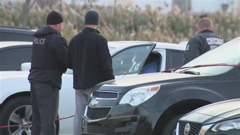 Man shot while sitting in parked car in Loop