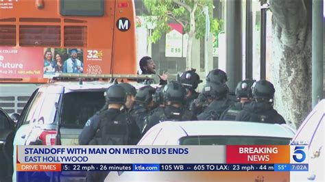 Man surrenders after hours-long standoff on Metro bus in Hollywood