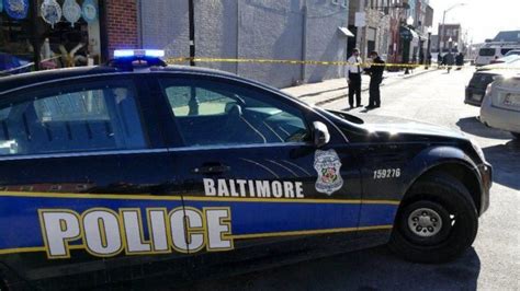 Man wielding 2 knives shot and wounded by Baltimore police, officials say
