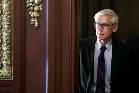 Man with handgun seeking Wisconsin Gov. Tony Evers arrested in state Capitol, posts bail and returns with assault rifle