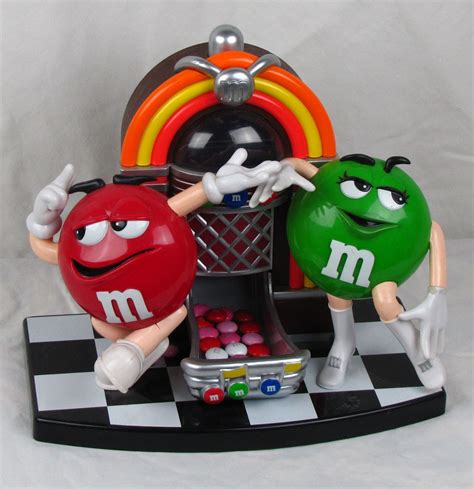 Mandm jukebox candy dispenser. Candy Dispenser, M&M, Reeses, Skittles $ 75.00. FREE shipping Add to Favorites ... NOS Vintage M&M’s Rock’n Roll Cafe Jukebox Candy Dispenser Red Green Limited (211) 