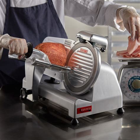 Manual meat slicer for home use. - La jeune fille a la perle girl with a pearl earring.