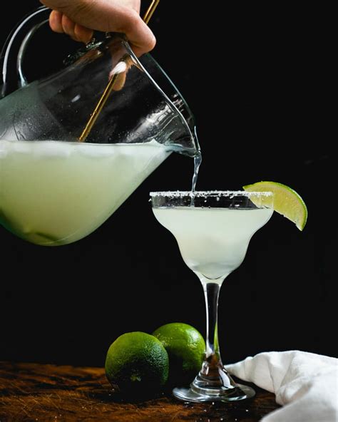 Margarita recipe pitcher. How to Make a Homemade Margarita. Combine tequila, freshly squeezed lime juice, simple syrup and water in a cocktail shaker. Then pour over a rimmed glass filled with crushed ice. Optional: garnish with a … 